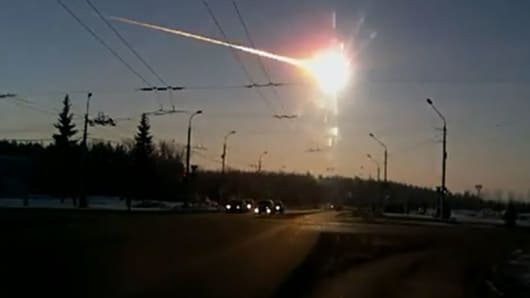 A meteor crashing in central Russia's Ural mountains.